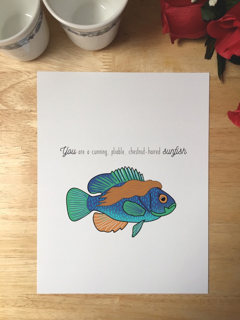 Print design with a sunfish that has long flowy brown hair. The text reads You are a cunning, pliable, chestnut-haired sunfish.